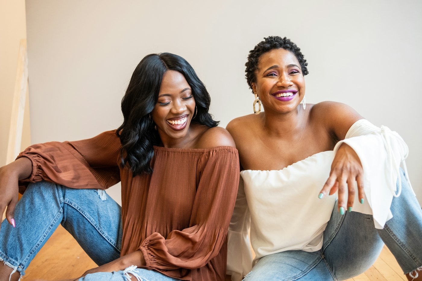 Two friends laughing together